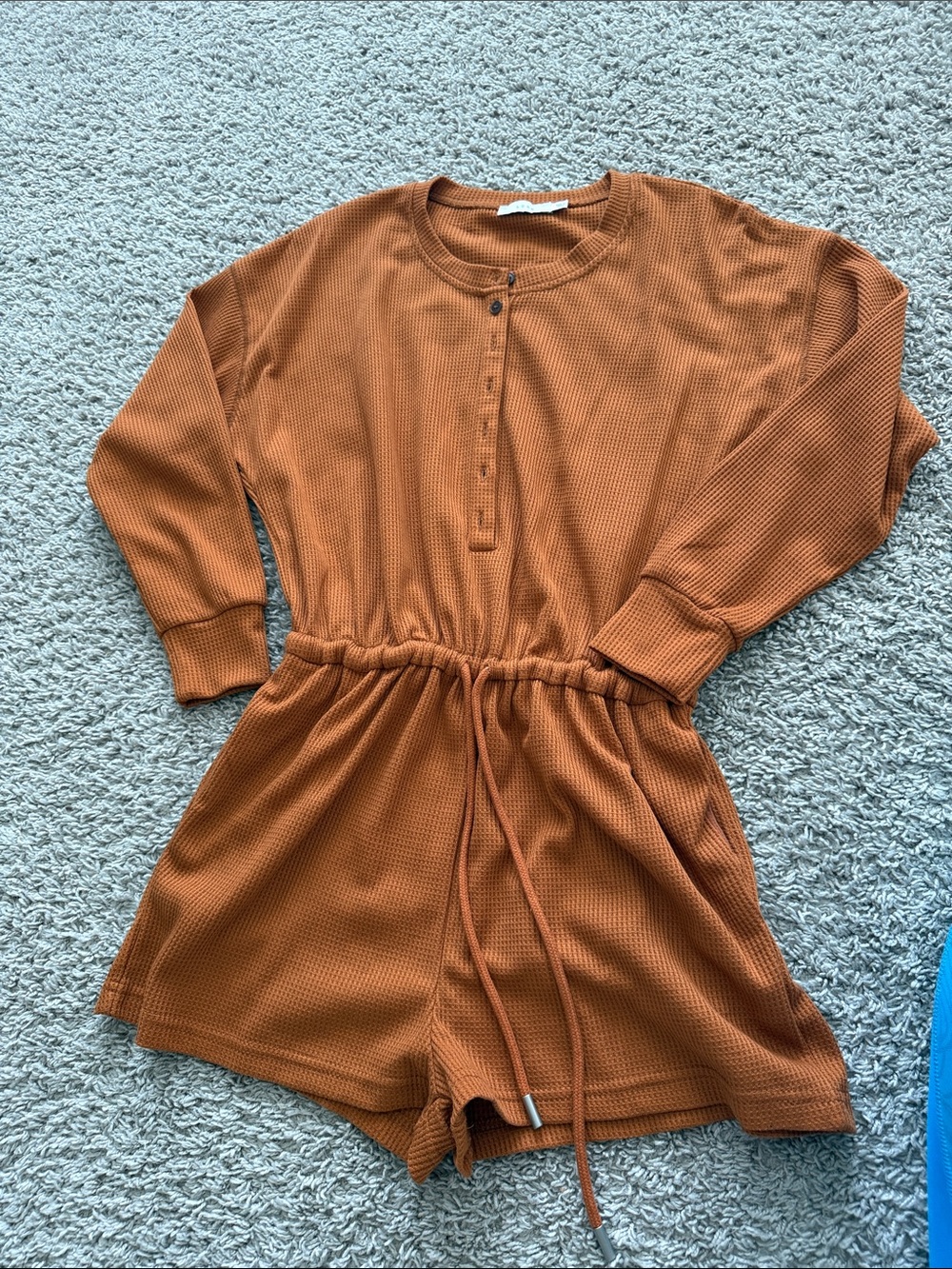 Lush Rust Orange Waffle-Knit Long-Sleeve Romper